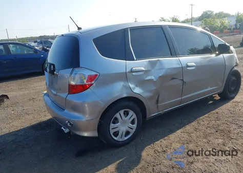 2009 Honda Fit from USA, damaged, VIN JHMGE88259S030096